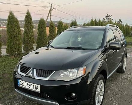 Черный Мицубиси Аутлендер, объемом двигателя 2.2 л и пробегом 310 тыс. км за 9700 $, фото 1 на Automoto.ua