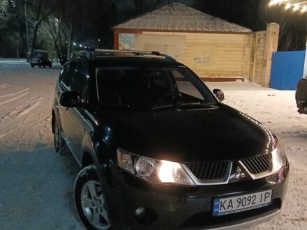 Чорний Міцубісі Аутлендер, об'ємом двигуна 2.4 л та пробігом 165 тис. км за 7600 $, фото 1 на Automoto.ua