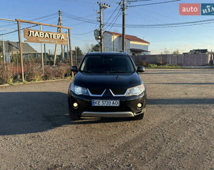 Черный Мицубиси Аутлендер, объемом двигателя 3 л и пробегом 150 тыс. км за 9499 $, фото 1 на Automoto.ua