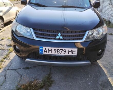 Черный Мицубиси Аутлендер, объемом двигателя 2.4 л и пробегом 199 тыс. км за 9000 $, фото 1 на Automoto.ua