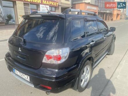 Мицубиси Аутлендер 2008 в Тернополе на Automoto.ua Черный Мицубиси Аутлендер, объемом двигателя 2 л и пробегом 178 тыс. км за 6850 $, фото 1 на Automoto.ua