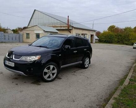 Черный Мицубиси Аутлендер, объемом двигателя 2.2 л и пробегом 200 тыс. км за 9500 $, фото 1 на Automoto.ua