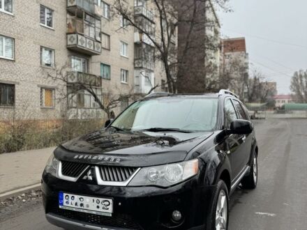 Чорний Міцубісі Аутлендер, об'ємом двигуна 2 л та пробігом 377 тис. км за 5200 $, фото 1 на Automoto.ua