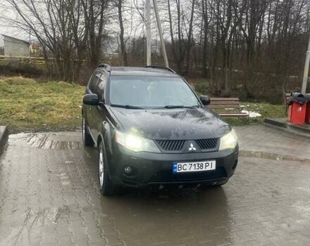 Чорний Міцубісі Аутлендер, об'ємом двигуна 3 л та пробігом 206 тис. км за 8500 $, фото 1 на Automoto.ua