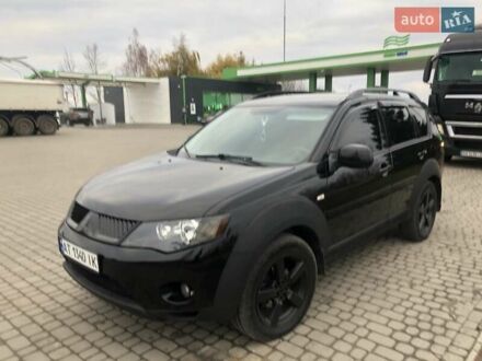 Чорний Міцубісі Аутлендер, об'ємом двигуна 2.4 л та пробігом 199 тис. км за 8999 $, фото 1 на Automoto.ua