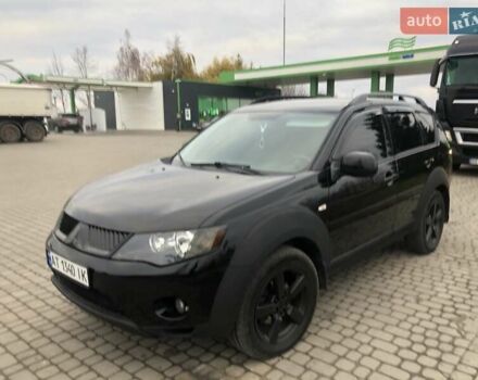 Чорний Міцубісі Аутлендер, об'ємом двигуна 2.4 л та пробігом 199 тис. км за 8999 $, фото 1 на Automoto.ua