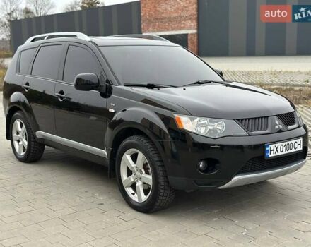Черный Мицубиси Аутлендер, объемом двигателя 3 л и пробегом 248 тыс. км за 9800 $, фото 1 на Automoto.ua