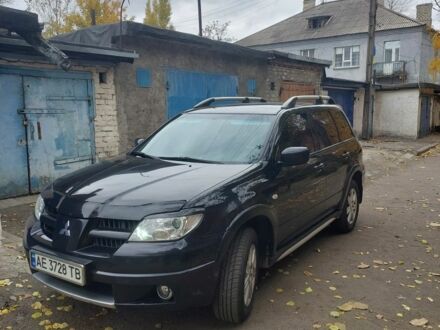 Чорний Міцубісі Аутлендер, об'ємом двигуна 2.4 л та пробігом 280 тис. км за 7200 $, фото 1 на Automoto.ua