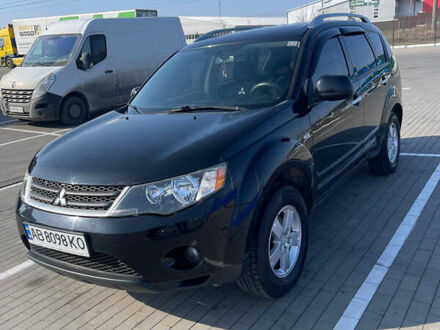 Чорний Міцубісі Аутлендер, об'ємом двигуна 2.4 л та пробігом 195 тис. км за 8600 $, фото 1 на Automoto.ua