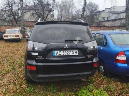 Черный Мицубиси Аутлендер, объемом двигателя 2.4 л и пробегом 242 тыс. км за 3400 $, фото 1 на Automoto.ua