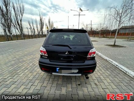 Мицубиси Аутлендер 2008 в Измаиле на Automoto.ua Черный Мицубиси Аутлендер, объемом двигателя 2.4 л и пробегом 203 тыс. км за 9000 $, фото 1 на Automoto.ua