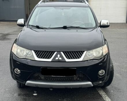 Чорний Міцубісі Аутлендер, об'ємом двигуна 2 л та пробігом 320 тис. км за 5946 $, фото 1 на Automoto.ua