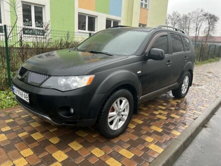 Чорний Міцубісі Аутлендер, об'ємом двигуна 2.4 л та пробігом 260 тис. км за 10000 $, фото 1 на Automoto.ua