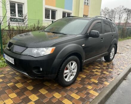Чорний Міцубісі Аутлендер, об'ємом двигуна 2.4 л та пробігом 260 тис. км за 10000 $, фото 1 на Automoto.ua