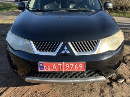 Чорний Міцубісі Аутлендер, об'ємом двигуна 2 л та пробігом 247 тис. км за 4600 $, фото 1 на Automoto.ua