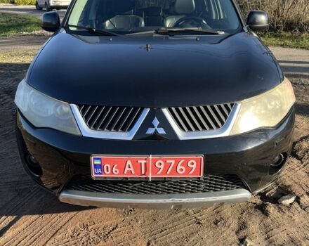 Черный Мицубиси Аутлендер, объемом двигателя 2 л и пробегом 247 тыс. км за 4600 $, фото 1 на Automoto.ua