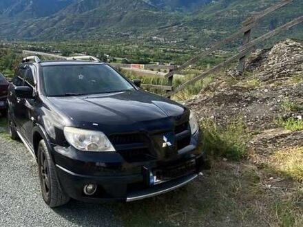 Міцубісі Аутлендер 2008 у Вышгороде на Automoto.ua Чорний Міцубісі Аутлендер, об'ємом двигуна 2.38 л та пробігом 211 тис. км за 8157 $, фото 1 на Automoto.ua