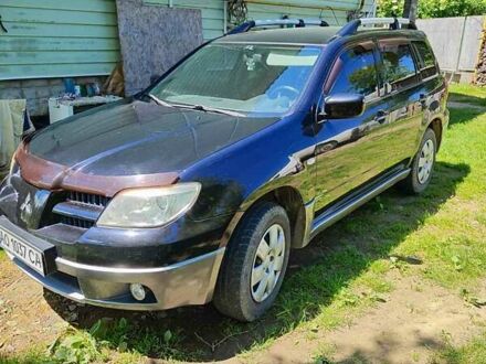Міцубісі Аутлендер 2008 у Тячеве на Automoto.ua Чорний Міцубісі Аутлендер, об'ємом двигуна 2 л та пробігом 230 тис. км за 5700 $, фото 1 на Automoto.ua