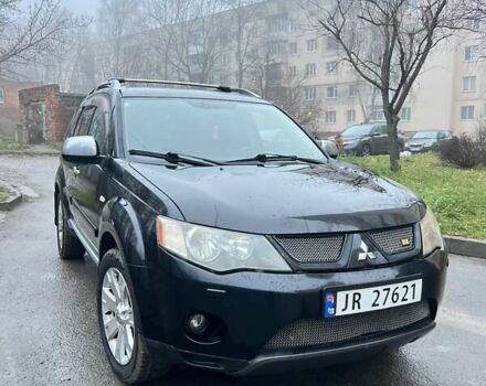 Чорний Міцубісі Аутлендер, об'ємом двигуна 2 л та пробігом 330 тис. км за 4900 $, фото 1 на Automoto.ua