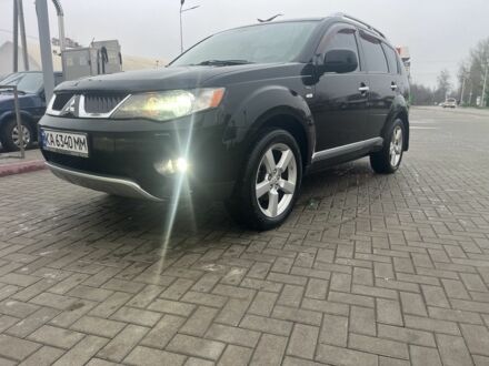 Черный Мицубиси Аутлендер, объемом двигателя 3 л и пробегом 220 тыс. км за 8300 $, фото 1 на Automoto.ua