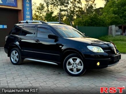 Мицубиси Аутлендер 2008 в Ахтырке на Automoto.ua Черный Мицубиси Аутлендер, объемом двигателя 2.4 л и пробегом 159 тыс. км за 7300 $, фото 1 на Automoto.ua