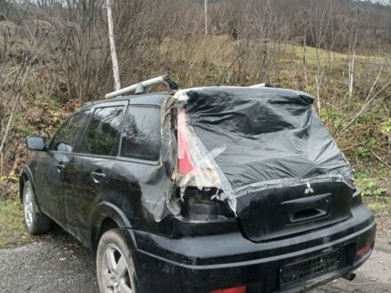 Чорний Міцубісі Аутлендер, об'ємом двигуна 0 л та пробігом 177 тис. км за 1700 $, фото 1 на Automoto.ua