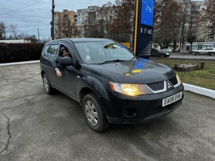 Черный Мицубиси Аутлендер, объемом двигателя 2 л и пробегом 178 тыс. км за 2800 $, фото 1 на Automoto.ua