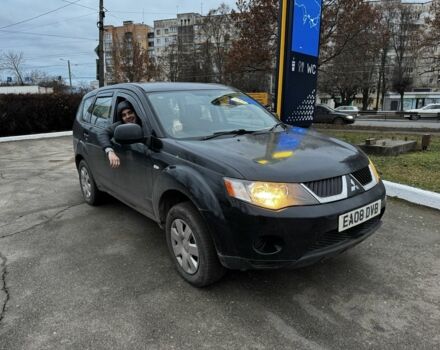 Черный Мицубиси Аутлендер, объемом двигателя 2 л и пробегом 178 тыс. км за 2800 $, фото 1 на Automoto.ua