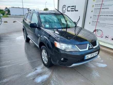 Чорний Міцубісі Аутлендер, об'ємом двигуна 2 л та пробігом 300 тис. км за 7500 $, фото 1 на Automoto.ua