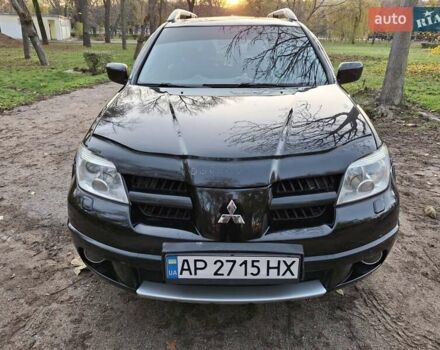 Чорний Міцубісі Аутлендер, об'ємом двигуна 2.38 л та пробігом 245 тис. км за 6800 $, фото 1 на Automoto.ua