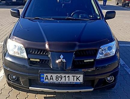 Міцубісі Аутлендер 2008 у Києві на Automoto.ua Чорний Міцубісі Аутлендер, об'ємом двигуна 2 л та пробігом 364 тис. км за 5900 $, фото 1 на Automoto.ua