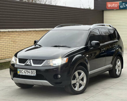 Чорний Міцубісі Аутлендер, об'ємом двигуна 2.4 л та пробігом 221 тис. км за 8900 $, фото 1 на Automoto.ua
