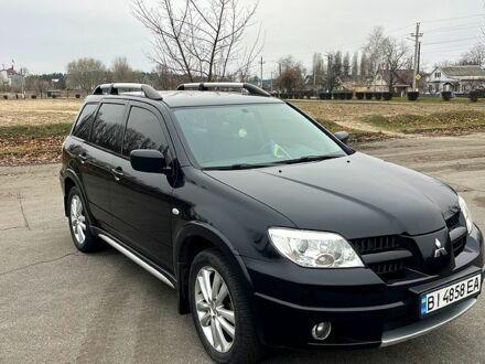 Мицубиси Аутлендер 2008 в Горишние Плавни (Комсомольск) на Automoto.ua Черный Мицубиси Аутлендер, объемом двигателя 2.4 л и пробегом 192 тыс. км за 9500 $, фото 1 на Automoto.ua