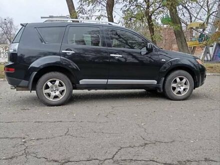 Чорний Міцубісі Аутлендер, об'ємом двигуна 2.36 л та пробігом 265 тис. км за 8800 $, фото 1 на Automoto.ua