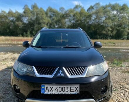 Черный Мицубиси Аутлендер, объемом двигателя 3 л и пробегом 150 тыс. км за 400 $, фото 1 на Automoto.ua