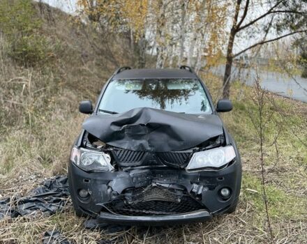 Черный Мицубиси Аутлендер, объемом двигателя 2 л и пробегом 360 тыс. км за 2000 $, фото 1 на Automoto.ua