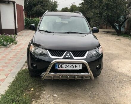 Черный Мицубиси Аутлендер, объемом двигателя 3 л и пробегом 180 тыс. км за 9028 $, фото 1 на Automoto.ua