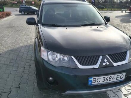 Чорний Міцубісі Аутлендер, об'ємом двигуна 2.4 л та пробігом 238 тис. км за 8900 $, фото 1 на Automoto.ua