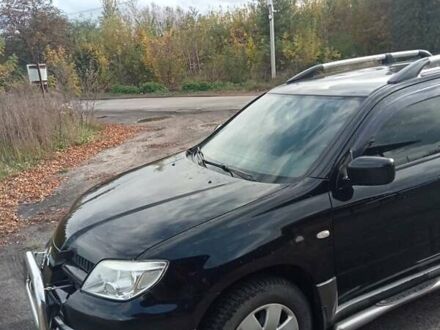 Міцубісі Аутлендер 2008 у Сосновке на Automoto.ua Чорний Міцубісі Аутлендер, об'ємом двигуна 2 л та пробігом 170 тис. км за 8000 $, фото 1 на Automoto.ua