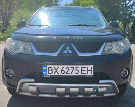 Черный Мицубиси Аутлендер, объемом двигателя 2.4 л и пробегом 180 тыс. км за 9000 $, фото 1 на Automoto.ua