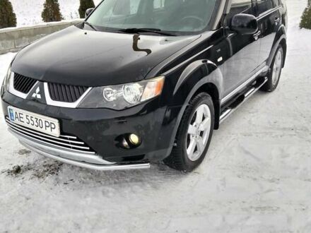 Черный Мицубиси Аутлендер, объемом двигателя 3 л и пробегом 247 тыс. км за 9600 $, фото 1 на Automoto.ua
