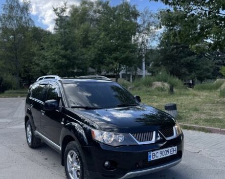 Чорний Міцубісі Аутлендер, об'ємом двигуна 2 л та пробігом 340 тис. км за 8996 $, фото 1 на Automoto.ua