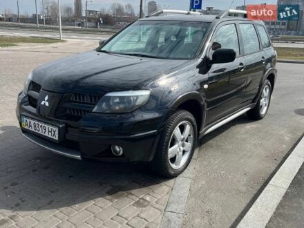 Чорний Міцубісі Аутлендер, об'ємом двигуна 2 л та пробігом 117 тис. км за 8500 $, фото 1 на Automoto.ua