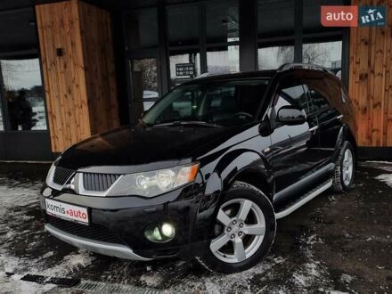 Чорний Міцубісі Аутлендер, об'ємом двигуна 2.4 л та пробігом 249 тис. км за 9299 $, фото 1 на Automoto.ua