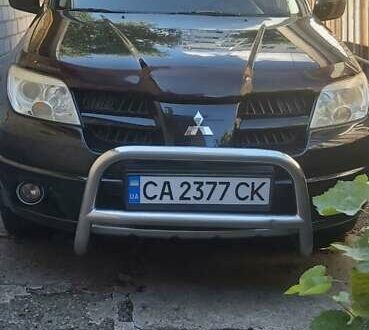 Міцубісі Аутлендер 2008 у Черкасах на Automoto.ua Чорний Міцубісі Аутлендер, об'ємом двигуна 2 л та пробігом 196 тис. км за 7750 $, фото 1 на Automoto.ua
