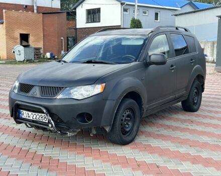 Черный Мицубиси Аутлендер, объемом двигателя 2.2 л и пробегом 300 тыс. км за 3450 $, фото 1 на Automoto.ua