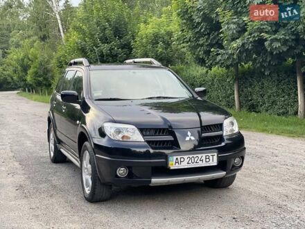 Міцубісі Аутлендер 2009 у Вінниці на Automoto.ua Чорний Міцубісі Аутлендер, об'ємом двигуна 2 л та пробігом 79 тис. км за 9500 $, фото 1 на Automoto.ua