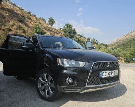 Чорний Міцубісі Аутлендер, об'ємом двигуна 2 л та пробігом 310 тис. км за 9800 $, фото 1 на Automoto.ua