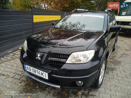 Мицубиси Аутлендер 2009 в Шаргороде на Automoto.ua Черный Мицубиси Аутлендер, объемом двигателя 2 л и пробегом 330 тыс. км за 5500 $, фото 1 на Automoto.ua