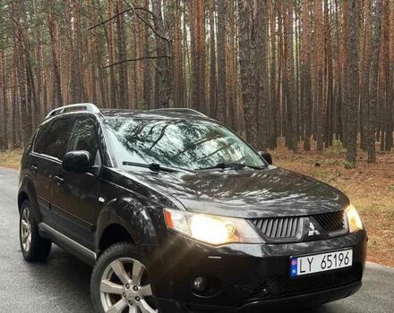 Чорний Міцубісі Аутлендер, об'ємом двигуна 2 л та пробігом 280 тис. км за 4500 $, фото 1 на Automoto.ua